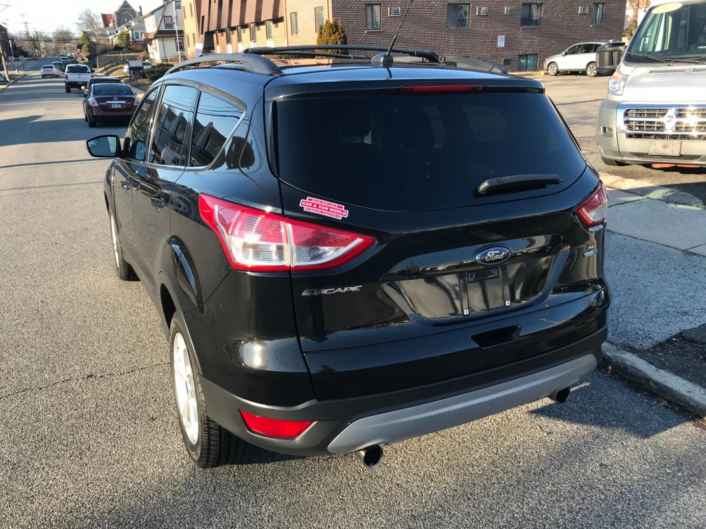 2013 Black /Black Ford Escape SE (1FMCU9G93DU) with an 2.0 V4 engine, Automatic transmission, located at 577 Chester Pike, Prospect Park, PA, 19076, (610) 237-1015, 39.886154, -75.302338 - Photo#5